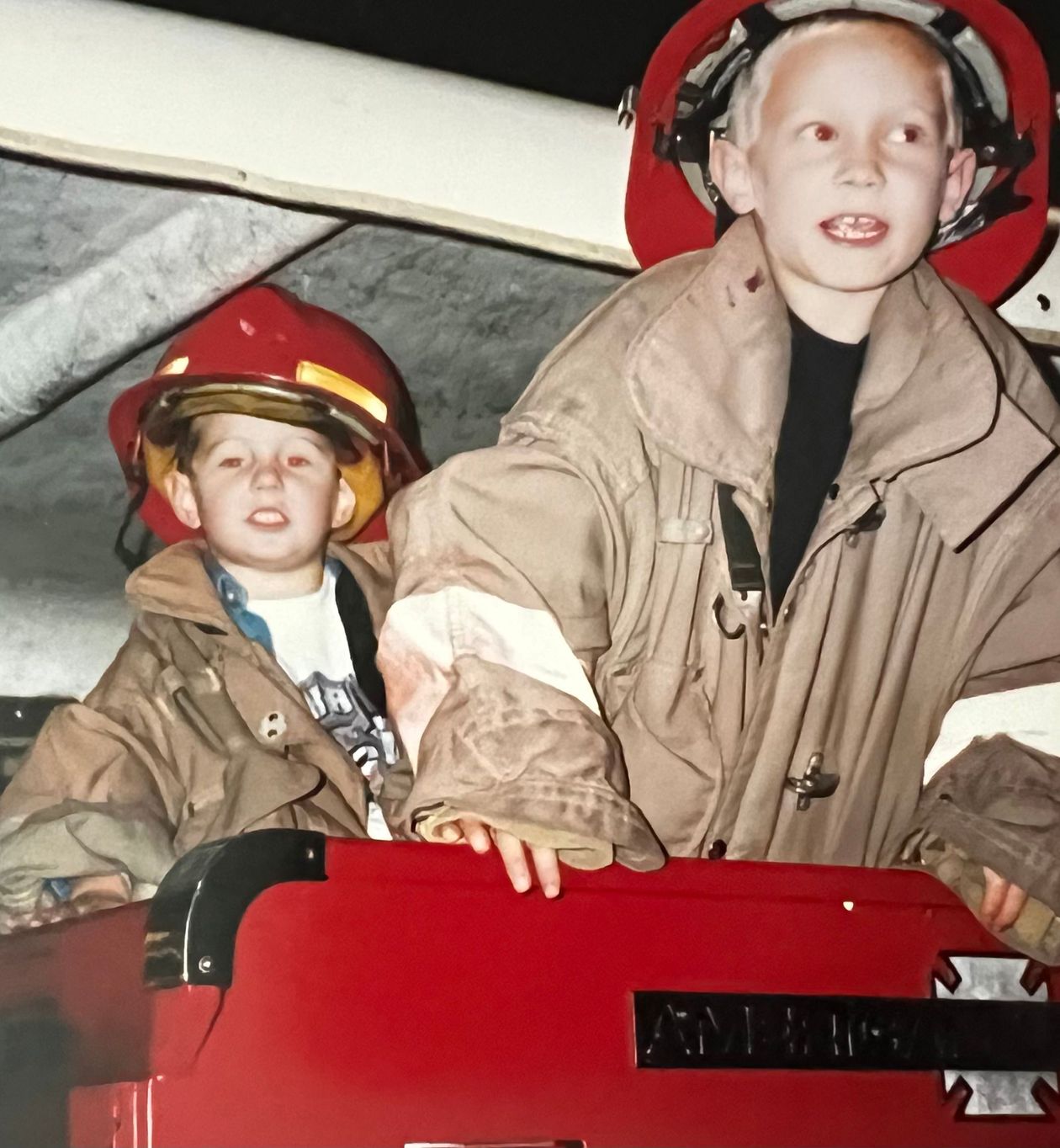 owners as children playing fireman